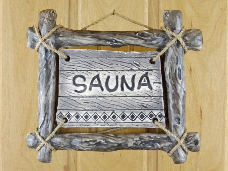 Doorplate Sauna with a branch frame