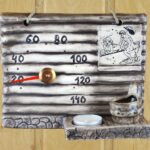 Sauna thermometer with aroma and candle holder