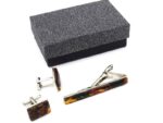Set of tie pin and cufflinks with amber