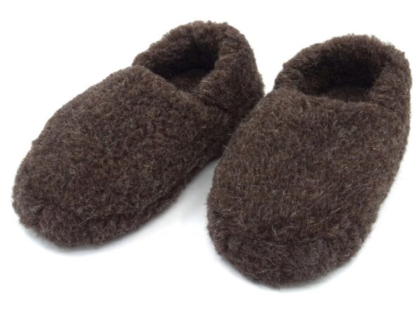 Warm slippers made of sheep wool and with a thick sole dark brown